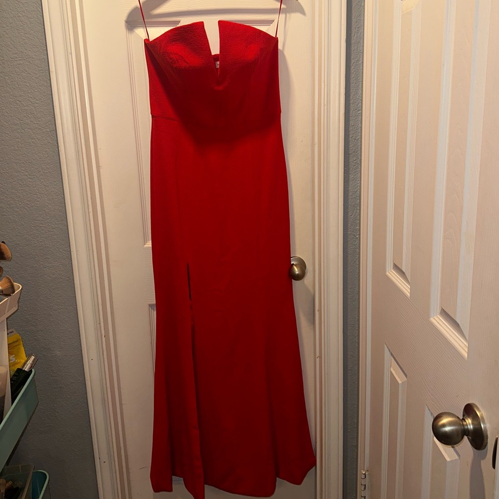 Red Fernanda strapless side slit gown by Dress the Population size M.